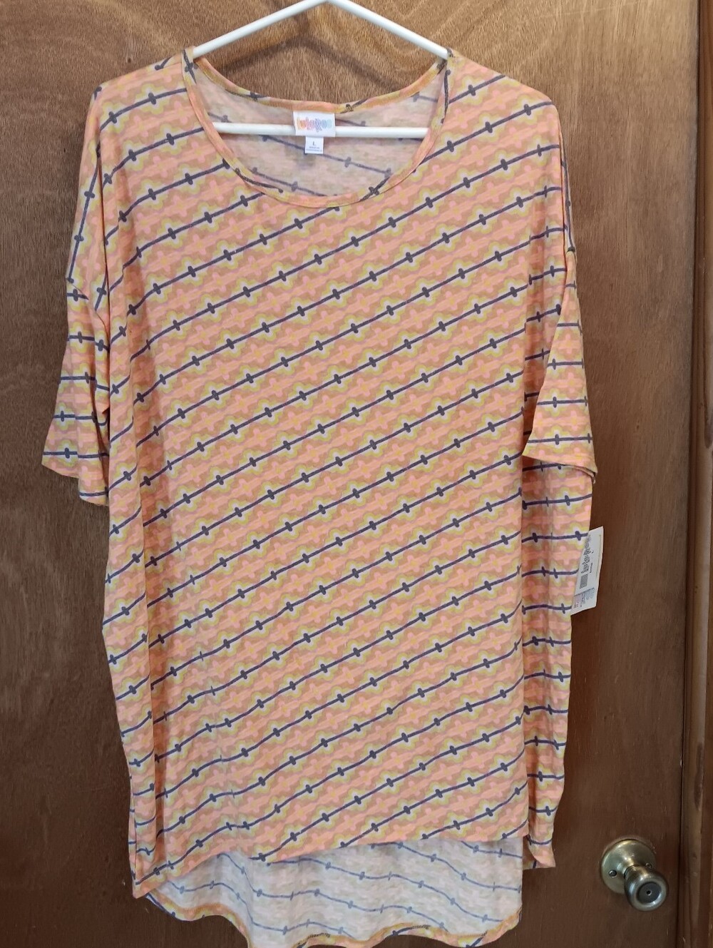 LuLaRoe Peach Pink Diagonal Pattern Short Sleeve Top